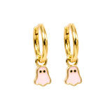 A pair of gold huggie hoop earrings with dangling ghost charms filled with light pink enamel, shown on a plain white background.